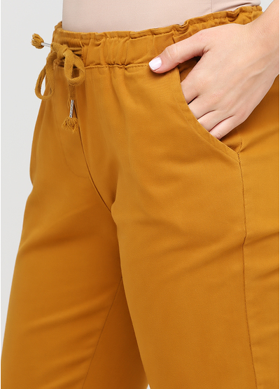 Желтые демисезонные зауженные брюки Made in Italy
